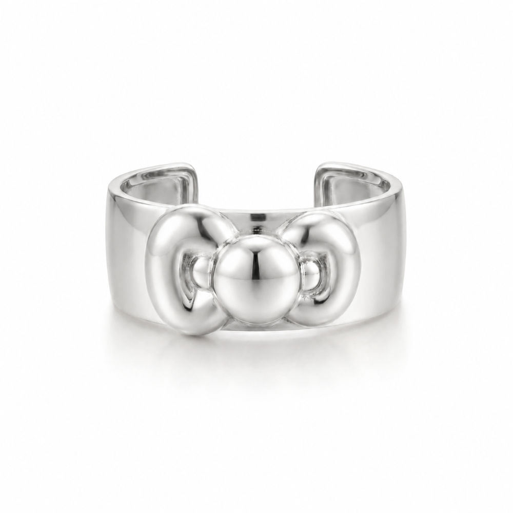 White gold plated statement cuff bangle with Hello Kitty Bow by Couture Kingdom on a white background