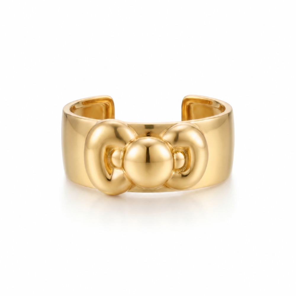 Yellow gold plated statement cuff bangle with Hello Kitty Bow by Couture Kingdom on a white background