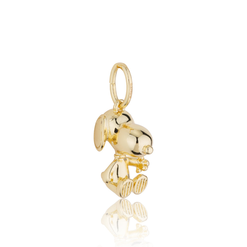 Gold Snoopy charm on a white background