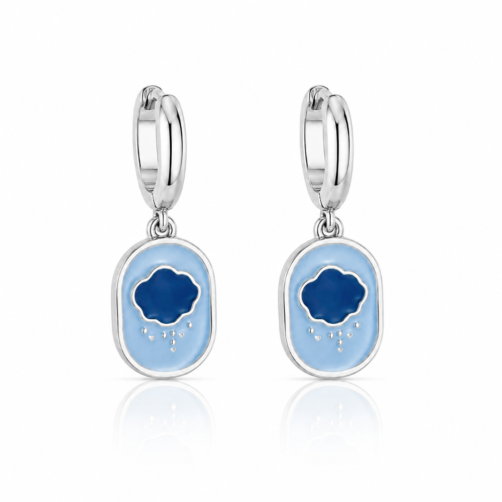 White gold mini hoop earrings with Care Bears Grumpy Bear enamel belly badge icon charm hanging from bottom on a white background by Couture Kingdom