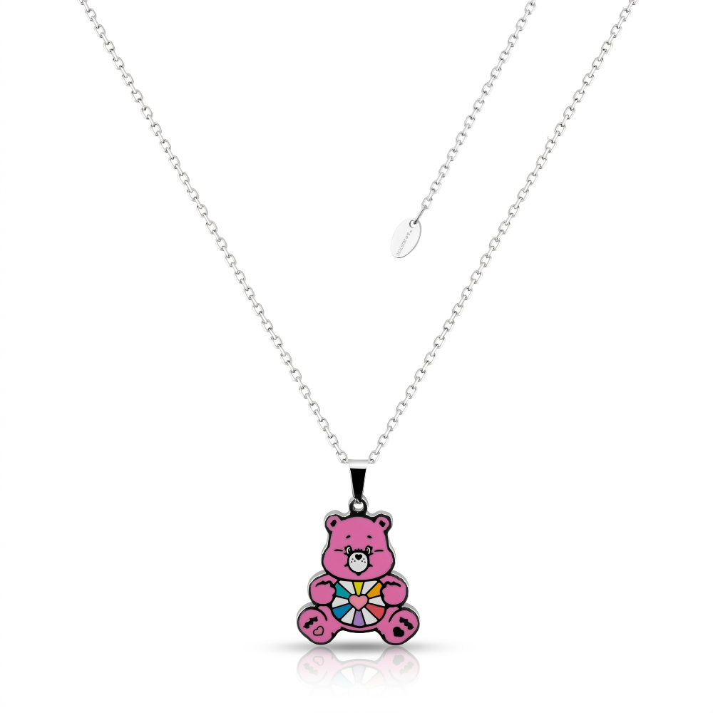 Stainless steel pink enamel Hopeful Heart Bear care bear necklace on a white background by Couture Kingdom