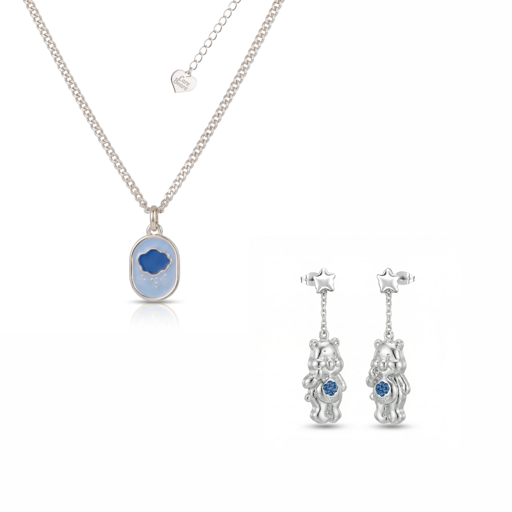 Silver Grumpy Bear Care Bears necklace and drop earrings with blue crystals set on a white background by Couture Kingdom