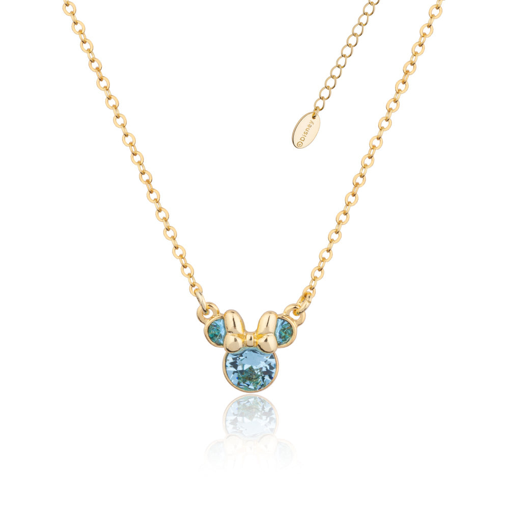 Gold necklace with a Minnie Mouse March Birthstones, blue gemstone pendant on a white background by Couture Kingdom