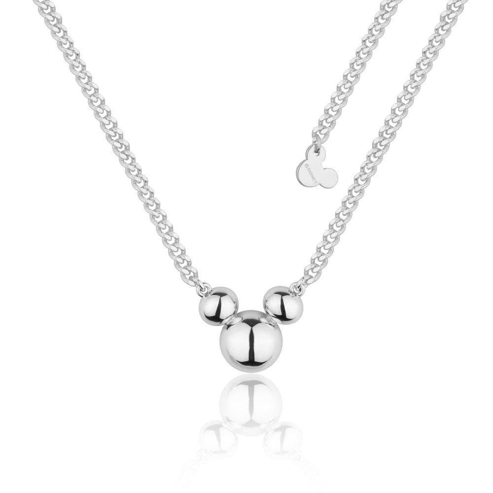 white gold plated mickey mouse pendant on a thicker flat curb chain by couture kingdom on a white background