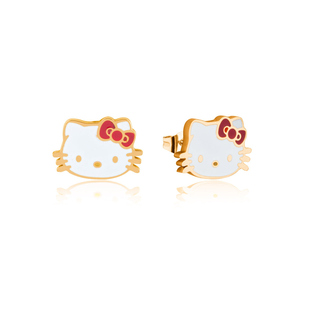 Hello Kitty earrings with gold frame and red bow on a white background