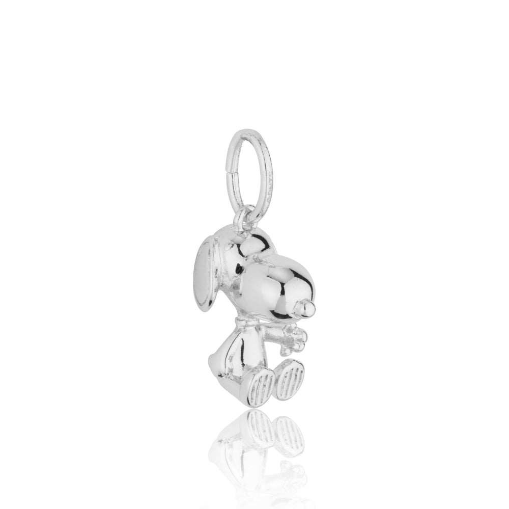 White gold Snoopy charm on a white background