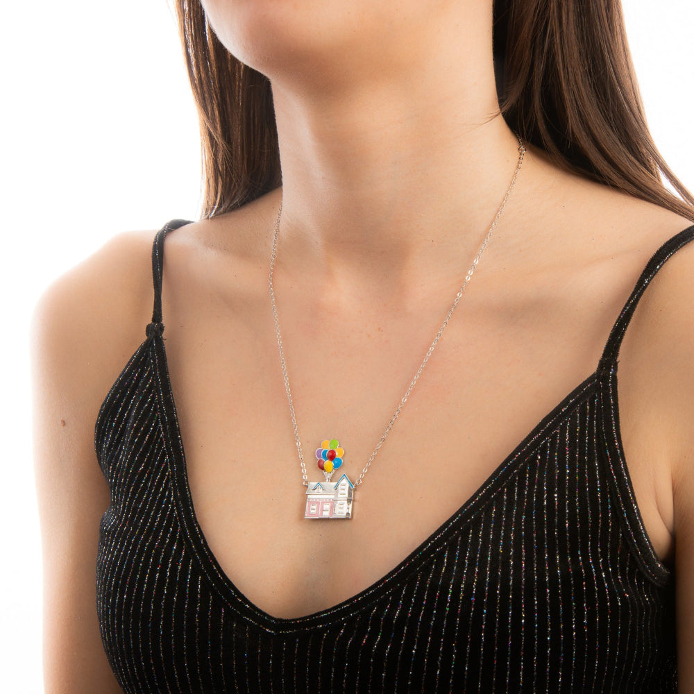 white gold necklace with Disney Pixar Enamel Up House pendant worn on model with a black singlet top by Couture Kingdom